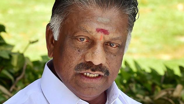 O Panneerselvam gestures as he approaches the Election Commission in New Delhi. (PTI File Photo) O Panneerselvam gestures as he approaches the Election Commission in New Delhi. (PTI File Photo)