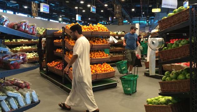 Customers are seen shopping at the al-Meera market in the Qatari capital Doha. (AFP Photo) Customers are seen shopping at the al-Meera market in the Qatari capital Doha. (AFP Photo)