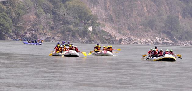 Colourful rafts are visible in the Ganga in Rishikesh. (HT photo) Colourful rafts are visible in the Ganga in Rishikesh. (HT photo)