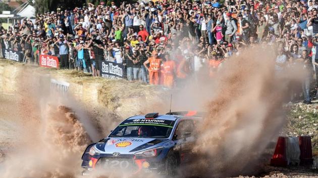 Belgian driver Thierry Neuville and co-driver Nicolas Gilsoul drive their Hyundai i20 Coupe WRC at ‘Arena motocross’ near Ittiri, during the first stage of the 2017 FIA World Rally Championship in Sardegna. (Andreas SOLARO/ AFP)