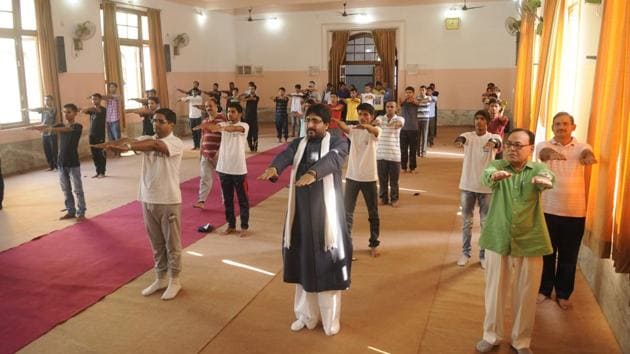 A yoga session being conducted at Shia Post Graduate Degree College in Lucknow.(Deepak Gupta/ HT Photo)