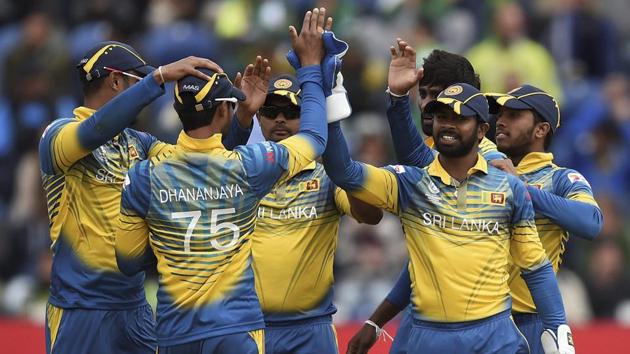 Cardiff : Sri Lanka's Dhananjaya de Silva and Niroshan Dickwella, right, celebrate taking the wicket of Pakistan's Babar Azam. (AP) Cardiff : Sri Lanka's Dhananjaya de Silva and Niroshan Dickwella, right, celebrate taking the wicket of Pakistan's Babar Azam. (AP)