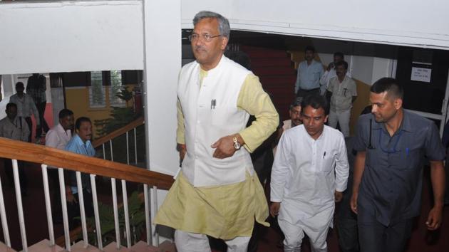 Chief minister Trivendra Singh Rawat arrives in the state assembly on Monday. (Vinay Santosh Kumar/HT Photo) Chief minister Trivendra Singh Rawat arrives in the state assembly on Monday. (Vinay Santosh Kumar/HT Photo)