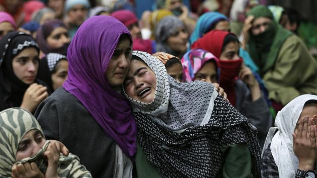 A relative cries near the body of civilian Adil Magray during his funeral at Shopian, about 60 kilometers south of Srinagar on June 7, 2017. Magray, was killed last Tuesday after government forces opened fire on protesters during a search operation to flush out Kashmiri rebels. (AP) A relative cries near the body of civilian Adil Magray during his funeral at Shopian, about 60 kilometers south of Srinagar on June 7, 2017. Magray, was killed last Tuesday after government forces opened fire on protesters during a search operation to flush out Kashmiri rebels. (AP)