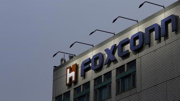 The logo of Foxconn, the trading name of Hon Hai Precision Industry, is seen on top of the company's headquarters in New Taipei City, Taiwan. (Reuters) The logo of Foxconn, the trading name of Hon Hai Precision Industry, is seen on top of the company's headquarters in New Taipei City, Taiwan. (Reuters)