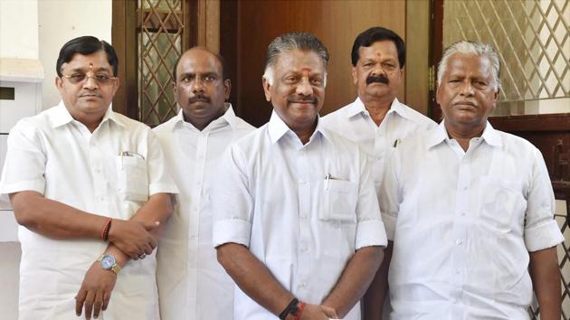 Former Tamil Nadu Chief Minister O Panneerselvam (centre) with former AIADMK minister KP Munusamy (R) and AIADMK Rajya Sabha MP V Maitreyan (L) when they approached the Election Commission urging it to restrain the VK Sasikala faction from using the AIADMK office, in New Delhi on May 19, 2017. (PTI) Former Tamil Nadu Chief Minister O Panneerselvam (centre) with former AIADMK minister KP Munusamy (R) and AIADMK Rajya Sabha MP V Maitreyan (L) when they approached the Election Commission urging it to restrain the VK Sasikala faction from using the AIADMK office, in New Delhi on May 19, 2017. (PTI)