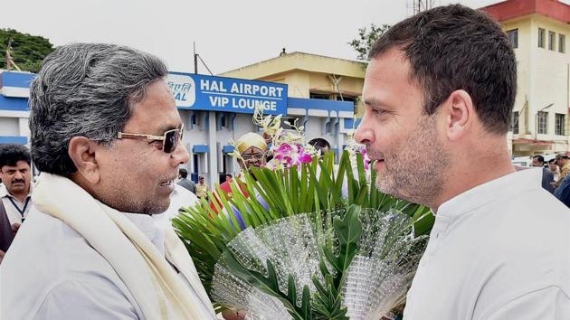 Congress Vice President Rahul Gandhi with former Karnataka Chief Minister Siddaramiah. No government in the past 33 years has managed to beat anti-incumbency.(PTI) Congress Vice President Rahul Gandhi with former Karnataka Chief Minister Siddaramiah. No government in the past 33 years has managed to beat anti-incumbency.(PTI)