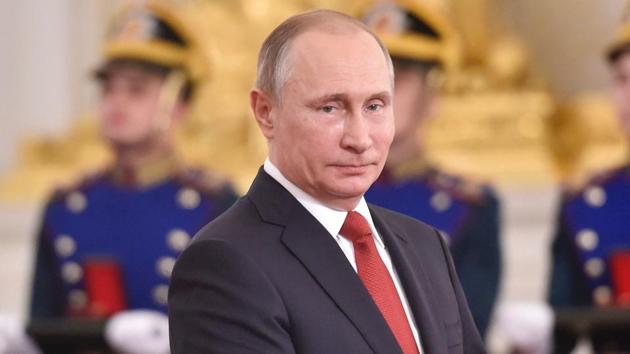 Russian President Vladimir Putin applauds during the State Prize awards ceremony marking the 'Day of Russia' at the Grand Kremlin Palace in Moscow. (AFP Photo) Russian President Vladimir Putin applauds during the State Prize awards ceremony marking the 'Day of Russia' at the Grand Kremlin Palace in Moscow. (AFP Photo)
