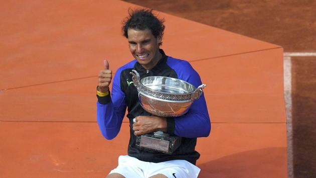 Rafael Nadal became the first men’s player in tennis history to win a Grand Slam 10 times as he defeated Stan Wawrinka to win the French Open for the 10th time. (AFP) Rafael Nadal became the first men’s player in tennis history to win a Grand Slam 10 times as he defeated Stan Wawrinka to win the French Open for the 10th time. (AFP)