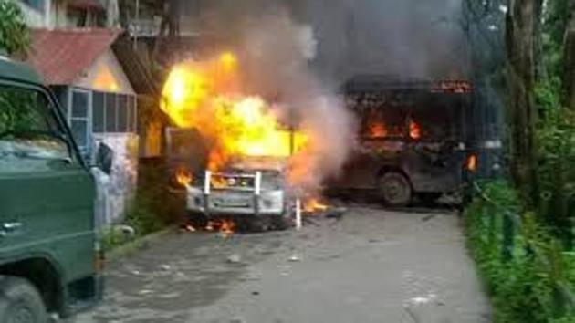 File picture of police vehicles set ablaze allegedly by GJM supporters in Darjeeling on June 8. With the hill parties unanimously deciding to push for a separate state, the confrontation with the Mamata Banerjee administration may intensify in the coming days. (HT Photo) File picture of police vehicles set ablaze allegedly by GJM supporters in Darjeeling on June 8. With the hill parties unanimously deciding to push for a separate state, the confrontation with the Mamata Banerjee administration may intensify in the coming days. (HT Photo)