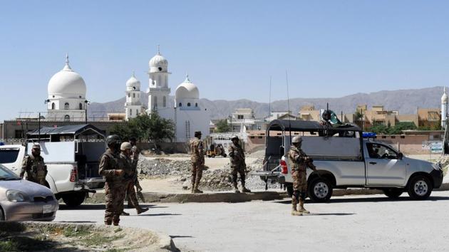Pakistani soldiers stand guard at the site where a Chinese couple was kidnapped in the neighbourhood of Jinnah town in Quetta on May 24. (AFP file photo) Pakistani soldiers stand guard at the site where a Chinese couple was kidnapped in the neighbourhood of Jinnah town in Quetta on May 24. (AFP file photo)