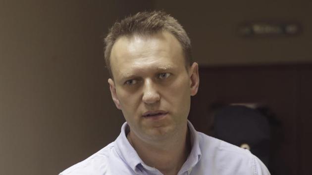 Russian opposition leader Alexei Navalny walks before hearing in a court in Moscow, Russia, on Monday, June 12, 2017. Navalny was arrested leaving his house headed to a protest (Pavel Golovkin/AP) Russian opposition leader Alexei Navalny walks before hearing in a court in Moscow, Russia, on Monday, June 12, 2017. Navalny was arrested leaving his house headed to a protest (Pavel Golovkin/AP)