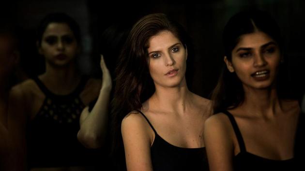 Models  backstage wait  for their turn to be on the ramp. (Aalok Soni/HT Photo) 