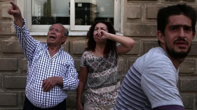 Lesbos Mayor Spyros Galinos and the fire service said the woman was found dead in the southern village of Vrisa that was worst-hit by the quake, which had its epicentre under the sea. (Elias Marcou / REUTERS) 