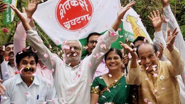 Farmers and activists of Vidharbha Rajya Andolan Samity (VRAS) celebrating after the Maharashtra government announced a loan waiver for farmers in the state, in Nagpur on Monday. (PTI) Farmers and activists of Vidharbha Rajya Andolan Samity (VRAS) celebrating after the Maharashtra government announced a loan waiver for farmers in the state, in Nagpur on Monday. (PTI)