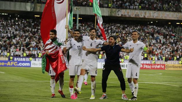 Iran's players celebrate after winning the 2018 World Cup qualifying football match against Uzbekistan at the Azadi Stadium in Tehran on Monday. (AFP) Iran's players celebrate after winning the 2018 World Cup qualifying football match against Uzbekistan at the Azadi Stadium in Tehran on Monday. (AFP)