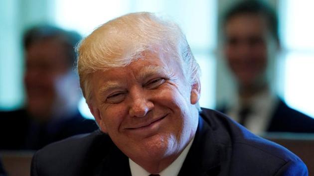US President Donald Trump smiles during a meeting with members of his Cabinet at the White House in Washington on Monday. (REUTERS) US President Donald Trump smiles during a meeting with members of his Cabinet at the White House in Washington on Monday. (REUTERS)