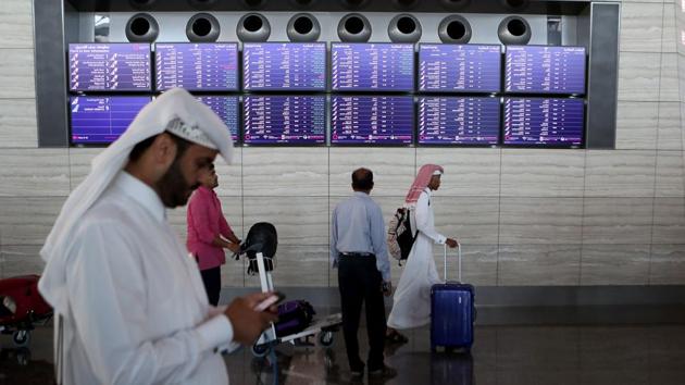 Passengers walk in the Hamad International Airport in the Qatari capital Doha on June 12, 2017. Qatar Airways called on the UN's aviation body to declare a Gulf boycott against the carrier "illegal" and a violation of a 1944 convention on international air transport. (AFP) Passengers walk in the Hamad International Airport in the Qatari capital Doha on June 12, 2017. Qatar Airways called on the UN's aviation body to declare a Gulf boycott against the carrier "illegal" and a violation of a 1944 convention on international air transport. (AFP)
