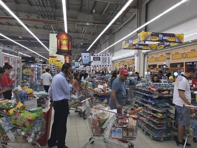 In this Monday, June 5, 2017 file photo, provided by Doha News, shoppers stock up on supplies at a supermarket in Doha, Qatar.(AP Photo)
