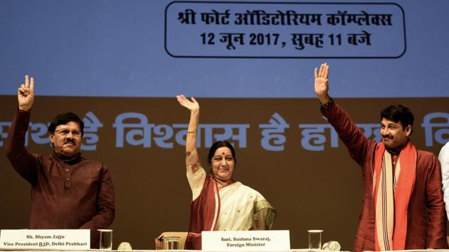Delhi BJP in-charge Shyam Jaju (from left), Union minister Sushma Swaraj and Delhi BJP chief Manoj Tiwari at a programme held to celebrate the completion of three years of the BJP government at Siri Fort Auditorium on Monday. (Sonu Mehta/HT PHOTO) Delhi BJP in-charge Shyam Jaju (from left), Union minister Sushma Swaraj and Delhi BJP chief Manoj Tiwari at a programme held to celebrate the completion of three years of the BJP government at Siri Fort Auditorium on Monday. (Sonu Mehta/HT PHOTO)