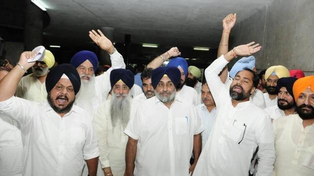 Shiromani Akali Dal president Sukhbir Singh Badal (centre) and other party MLAs walk out of the Punjab assembly to protest obituary reference to former DGP KPS Gill. (Keshav Singh/HT Photo) Shiromani Akali Dal president Sukhbir Singh Badal (centre) and other party MLAs walk out of the Punjab assembly to protest obituary reference to former DGP KPS Gill. (Keshav Singh/HT Photo)