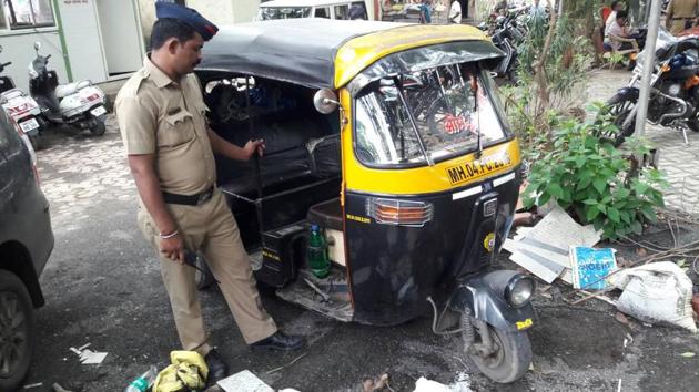 Police with the seized auto on Wednesday. (HT File Photo) Police with the seized auto on Wednesday. (HT File Photo)