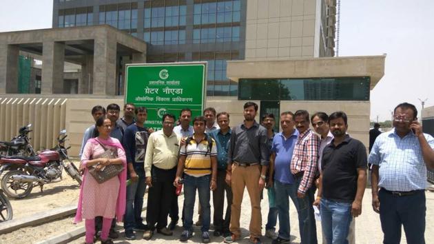 Buyers protest outside the authority office. Buyers protest outside the authority office.