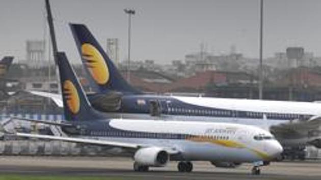 The Bombay high court on Tuesday directed the Directorate General of Civil Aviation (DGCA) to demolish or reduce the height of 35 buildings violating height norms around the airport, within three months. (HT) The Bombay high court on Tuesday directed the Directorate General of Civil Aviation (DGCA) to demolish or reduce the height of 35 buildings violating height norms around the airport, within three months. (HT)