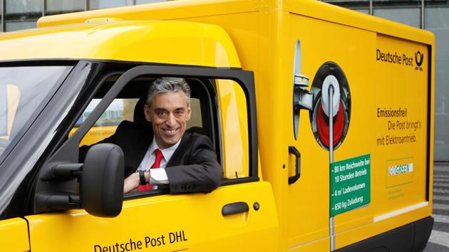 Frank Appel, CEO of German postal and logistics group Deutsche Post DHL looks out of a StreetScooter E-car in Bonn.(Reuters file photo)