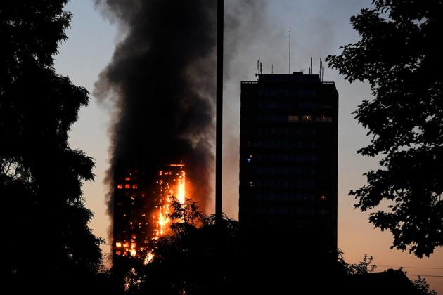 Flames and smoke billow from Grenfell Tower. (Reuters) Flames and smoke billow from Grenfell Tower. (Reuters)