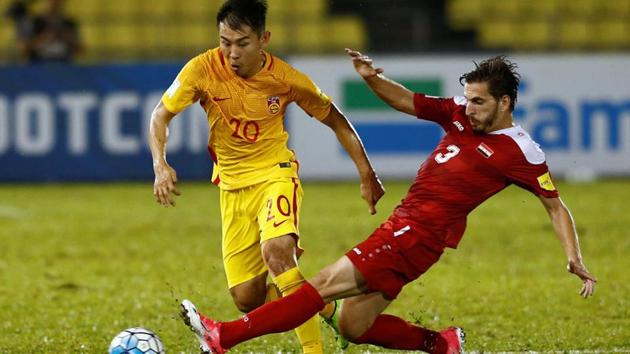 China's Yu Hanchao in action against Syria's Mouaiad Al Ajjan during a 2018 World Cup qualifier.(REUTERS) China's Yu Hanchao in action against Syria's Mouaiad Al Ajjan during a 2018 World Cup qualifier.(REUTERS)