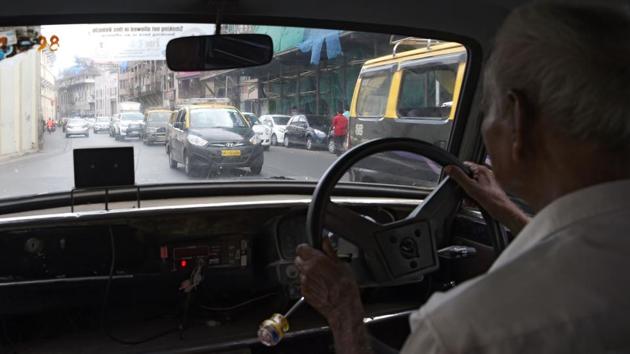 Indian taxi driver Dawood Khan, 80, drives his Premiere Padmini taxi in Mumbai. For many the passing of the Indian-built vehicle will be the end of an unforgettable chapter in Mumbai’s history. (INDRANIL MUKHERJEE / AFP) Indian taxi driver Dawood Khan, 80, drives his Premiere Padmini taxi in Mumbai. For many the passing of the Indian-built vehicle will be the end of an unforgettable chapter in Mumbai’s history. (INDRANIL MUKHERJEE / AFP)