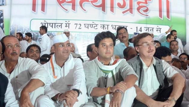 Congress leader and MP Jyotiraditya Scindia along with Rajya Sabha MP Vivek Tankha and congress state president Arun Yadav during the 72-hour Satyagraha to protest against the killing of farmers in Mandsaur police firing, in Bhopal, Madhya Pradesh on Wednesday. (PTI Photo) Congress leader and MP Jyotiraditya Scindia along with Rajya Sabha MP Vivek Tankha and congress state president Arun Yadav during the 72-hour Satyagraha to protest against the killing of farmers in Mandsaur police firing, in Bhopal, Madhya Pradesh on Wednesday. (PTI Photo)