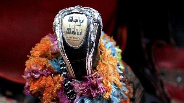 Decorations cover the gear shift of a truck outside Faisalabad. (Caren Firouz/REUTERS)