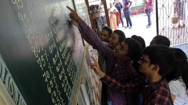 Students check their results in Thane.(Praful Gangurde)
