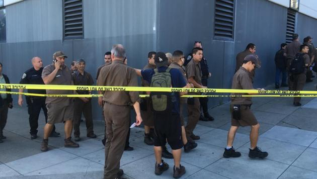 UPS workers gather outside after a reported shooting at a UPS warehouse and customer service center in San Francisco on Wednesday, June 14, 2017. (AP Photo) UPS workers gather outside after a reported shooting at a UPS warehouse and customer service center in San Francisco on Wednesday, June 14, 2017. (AP Photo)