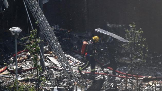 London’s Ambulance Service says 74 people are being treated, 20 of whom are in critical condition. (Neil Hall / REUTERS)