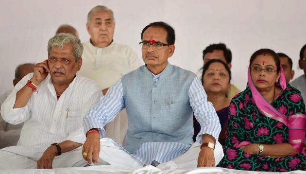 Madhya Pradesh CM Shivraj Singh Chauhan, who sat on a fast, will visit the families of the dead farmers on Wednesday. (PTI Photo) Madhya Pradesh CM Shivraj Singh Chauhan, who sat on a fast, will visit the families of the dead farmers on Wednesday. (PTI Photo)