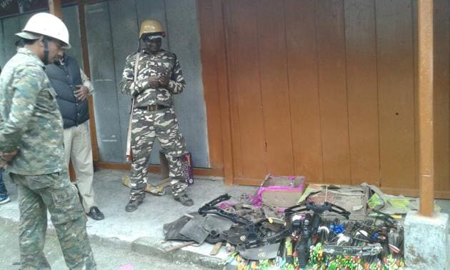 Police personnel with bows, arrows and explosives seized from GJM office in Darjeeling on Thursday. (Bikram Sashanker/HT Photo) Police personnel with bows, arrows and explosives seized from GJM office in Darjeeling on Thursday. (Bikram Sashanker/HT Photo)