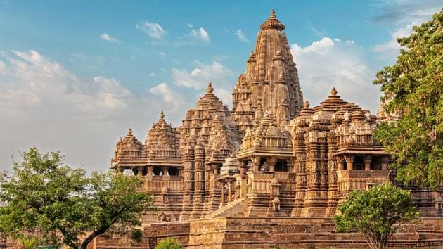 The Khajuraho temples in MP’s Chhatarpur district. The temple,a Unesco world heritage site, is famous for the graceful erotic sculptures on its outer walls.(Shutterstock)