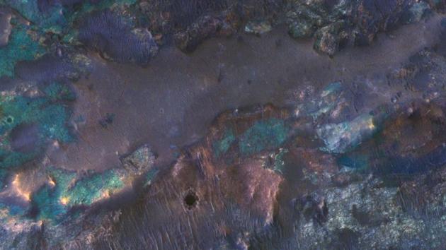 Colourful Impact Ejecta from Hargraves Crater: The collision that created Hargraves Crater impacted into diverse bedrock lithologies of ancient Mars.