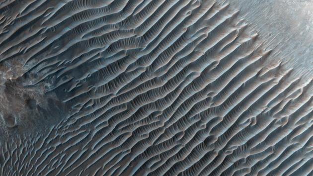 Small ripples, about 10 meters apart, located in Her Desher Vallis.