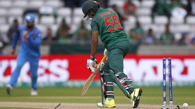 Bangladesh's Soumya Sarkar looks dejected after being bowled by India's Bhuvneshwar Kumar. (REUTERS) 