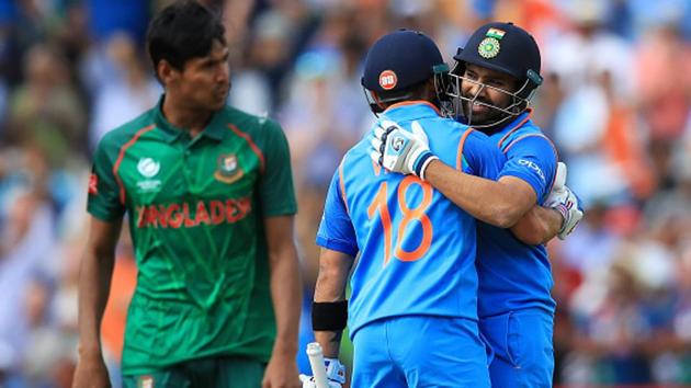 India cricket team skipper Virat Kohli congratulates Rohit Sharma after the opener reached his century during their ICC Champions Trophy semifinal against Bangladesh cricket team at Edgbaston, Birmingham, on Thursday. (Getty Images) India cricket team skipper Virat Kohli congratulates Rohit Sharma after the opener reached his century during their ICC Champions Trophy semifinal against Bangladesh cricket team at Edgbaston, Birmingham, on Thursday. (Getty Images)
