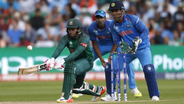 Bangladesh’s Mushfiqur Rahimen route to his half century against India. (REUTERS) 