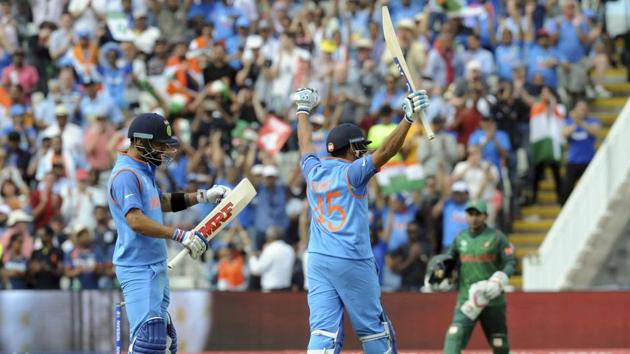 Rohit Sharma and Virat Kohli celebrate after a comfortable win over Bangladesh. (AP) 