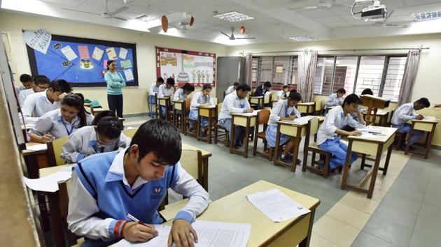 CBSE Class 12 students during the board exams at an exam centre in Blue Bells Model School, Gurgaon.