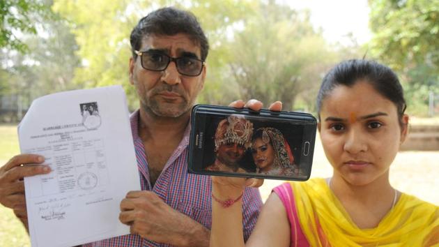 Savita Dharna with her father Jai Gopal from Jalandhar during the National Seminar on NRI marriage in Chandigarh on April 20, 2017. (Anil Dayal/HT FILE PHOTO) Savita Dharna with her father Jai Gopal from Jalandhar during the National Seminar on NRI marriage in Chandigarh on April 20, 2017. (Anil Dayal/HT FILE PHOTO)