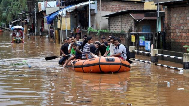 Residents of Anil Nagar and Nabin Nagar being evacuated by State Disaster Respond Force (SDRF) from flood affected areas in Guwahati . The district administration had ordered closure of government and private schools and colleges today. (PTI) Residents of Anil Nagar and Nabin Nagar being evacuated by State Disaster Respond Force (SDRF) from flood affected areas in Guwahati . The district administration had ordered closure of government and private schools and colleges today. (PTI)