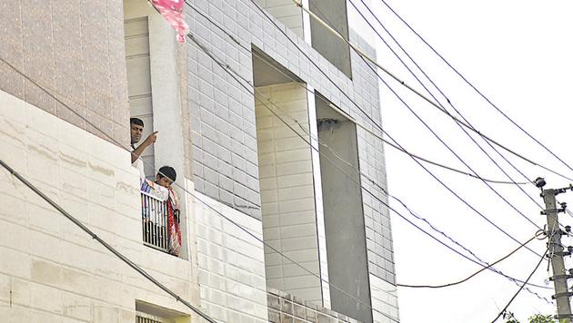 The loose power cables still hang outside the woman’s flat in Ghaziabad. (Sakib Ali/HT Photo) The loose power cables still hang outside the woman’s flat in Ghaziabad. (Sakib Ali/HT Photo)